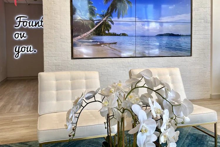 Clean, professional medical spa treatment room with neutral tones at OVME in Charlotte